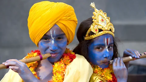 Keith Erskine/Alamy Children pose during London’s Rathayatra, the biggest festival of the International Society for Krishna Consciousness, at Trafalgar Square (Credit: Keith Erskine/Alamy )