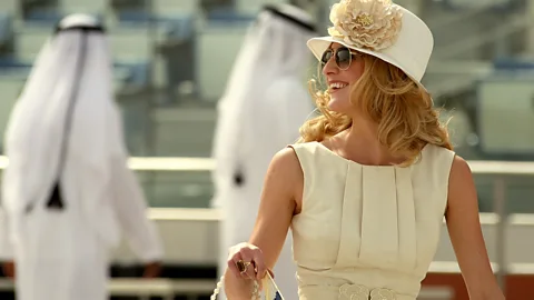 Getty Images A guest at the Dubai World Cup, a horse race with a $10m prize (Credit: Getty Images)