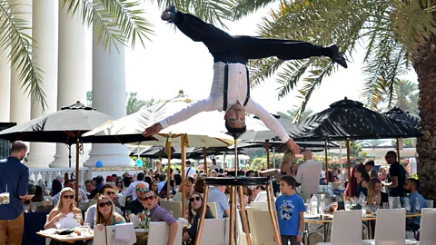 Nomee Gulfam Some brunches offer live entertainment such as acrobats – for a price (Credit: Nomee Gulfam)