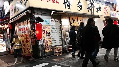 Eric Barton Japan's 500 yen ($4.58) ramen shops cater to workers looking for a quick meal after gruelling days (Credit: Eric Barton)