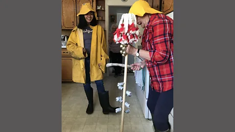 Suchi Rudra Part of the screech-in ceremony involves a mop handle-turned-traditional Newfoundland musical instrument known as an ‘ugly stick’ (Credit: Suchi Rudra)