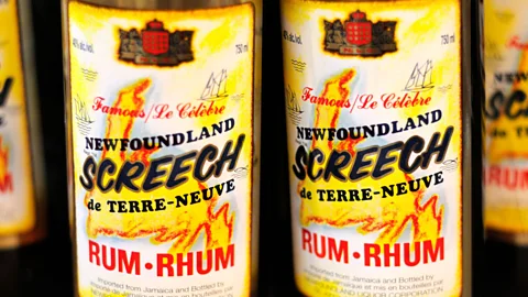 Norman Pogson/Alamy Lastly, screech-in participants must drink Newfoundland Screech, a spiced rum that evolved from Newfoundland’s trade relationships in the Caribbean (Credit: Norman Pogson/Alamy)