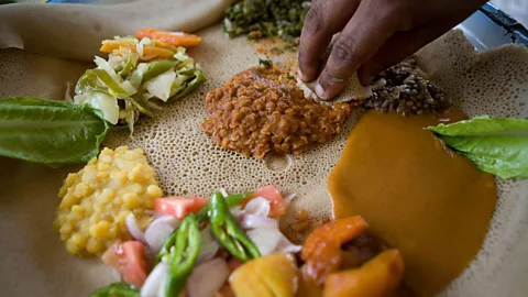ton koene/Alamy Teff is used to make injera, a pancake-like fermented bread perfect for scooping up meat and vegetable stews (Credit: ton koene/Alamy)