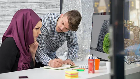 Alamy In the US, under-representation at senior leadership levels is linked more to racial stereotypes than to women dropping out of the workforce (Credit: Alamy)