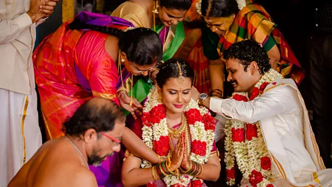 Aju Photography Although some couples are scaling back their large Indian weddings, others are keeping ceremonies just as lavish – but in a different way (Credit: Aju Photography)