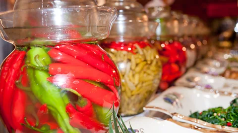 jiuyi lv/Alamy Unlike kimchi, pao cai ferments in a salt water, spice and vegetable brine – often for several years (Credit: jiuyi lv/Alamy)