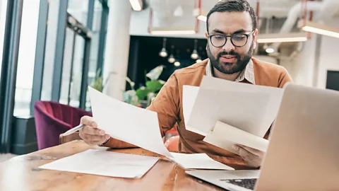 Getty Images Behind the scenes, hiring someone is a complicated process that involves many people, and it's only gotten more complicated as time has passed (Credit: Getty Images)