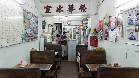 Kwan Wong/Alamy Serving up comforting East-West fusion dishes, cha chaan tengs are a vital part of Hong Kong culture (Credit: Kwan Wong/Alamy)