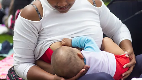 Getty Images A mother breastfeeds her child during the "all for breastfeeding" festival in Bogota, Colombia (Credit: Daniel Garzon Herazo/NurPhoto via Getty Images)