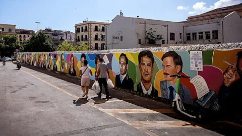 Getty Images "The Wall of Legality" in Palermo, with portraits of people who died in the fight against the mafia (Credit: Getty Images)