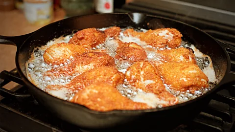 Stacey Newman Maryland chicken is dredged in seasoned flour and fried in a cast iron pan (Credit: Stacey Newman)