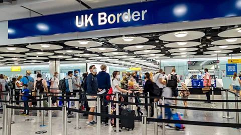 Getty Images Travellers in line at UK customs (Credit:Getty Images)