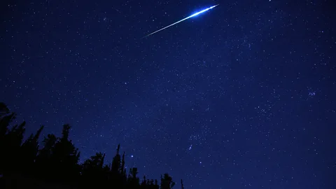 Getty Images The Geminids are particularly bright and show a variety of colours, which is unusual for a meteor shower (Credit: Getty Images)