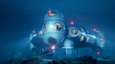 DEEP Computer image of underwater pod made up of five sections with red lights on the outside. Two divers are swimming in the foreground. 