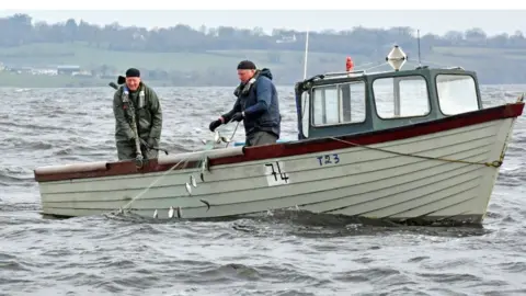 Cliff Mason, AFBI  Lough Neagh fishermen Dee McElroy and Dick McElroy