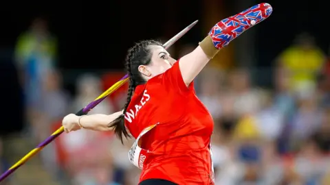 PA Hollie Arnold in action at the Gold Coast Games, throwing javelin in the F46 category