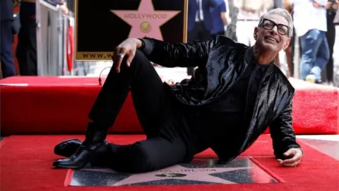 Reuters Jeff Goldblum poses on his new Walk of Fame star