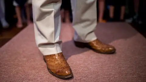 Getty Images Mr Cruz's ostrich skin boots were regularly seen during stump speeches during his 2016 presidential campaign