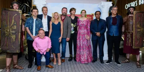 Getty Images The cast of the Horrible Histories movie: Craig Roberts, Alexander Armstrong, Warwick Davis, Sarah Hadland, Lee Mack, Sebastian Croft, Kate Nash, Sanjeev Bhaskar and Rupert Graves