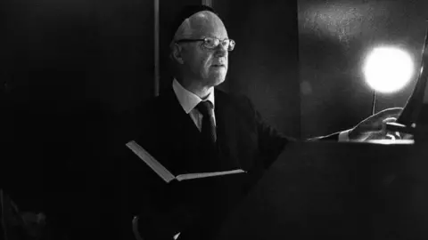 Nudrat Afza Man at the synagogue