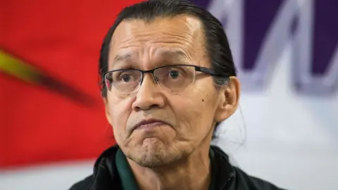 AFP via Getty Images Wet'suweten hereditary chief Frank Alec