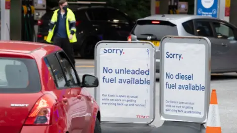 Getty Images 'No fuel' signs outside an petrol station in Cardiff on Friday