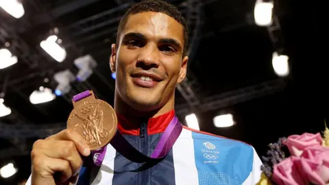 Getty Images Anthony Ogogo with his Olympic bronze from 2012