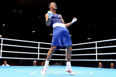 Getty Images Anthony Ogogo of Great Britain celebrates his victory over Levgen Khytrov of Ukraine during the Men's Middle (75kg) Boxing on Day 6 of the London 2012 Olympic Games