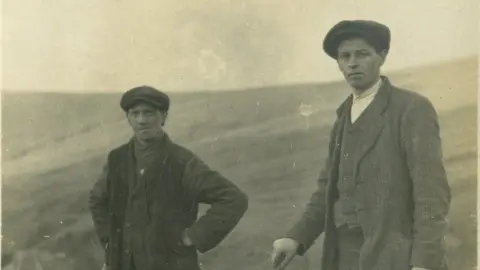 Cadw Workers at the site