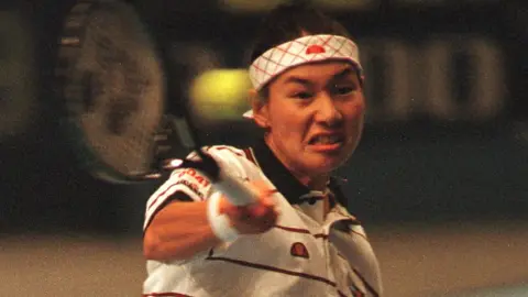 Al Bello/ALL SPORT 22 Nov 1996: Kimiko Date losing 6-1,6-2 to Martina Hingis at the WTA Chase Tournament at Madison Square Garden, New York.