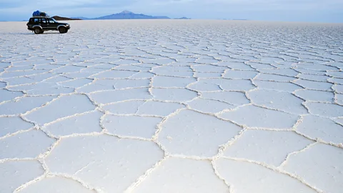 The sun rises over the Salar de Uyuni, the salt flats of southern Bolivia. (Audrey Scott)