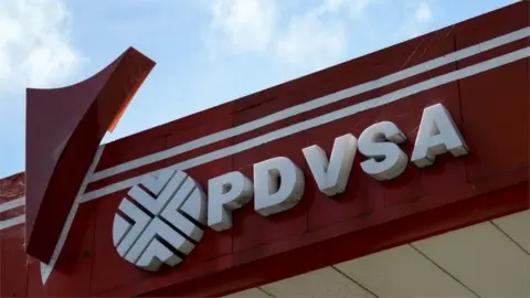 AFP The logo of Venezuelan state-owned oil company PDVSA at a gas station in Caracas.
