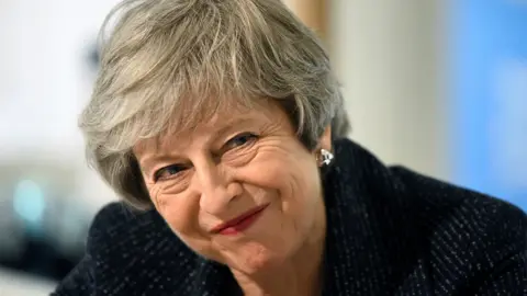 PA Theresa May