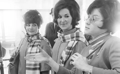 Getty Images Tanya Novacoff, Roberta Johnson and Charlene Delmonico at Denver airport