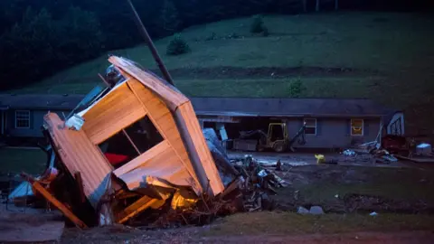 Getty Images A knocked over trailer in Elkview, West Virginia, after 2016's historic floods