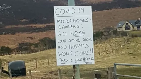 Teigan Johnston 'Go home' sign
