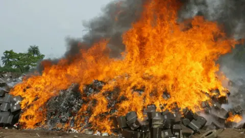 Getty Images This file picture taken on November 1, 2007 at Shagamu dump site in Ogun State, southwest Nigeria shows seized cartons of fake drugs set ablaze by officials of the National Agency for Food and Drug Administration and Control