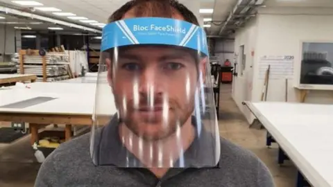 Bloc Blinds Worker in PPE