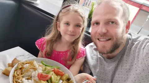 Daniel Davies-Luke Daniel and daughter Luna