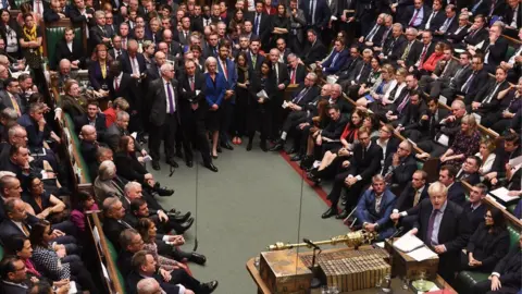 UK Parliament/Jessica Taylor A crowded House of Commons as MPs await the Brexit programme motion vote