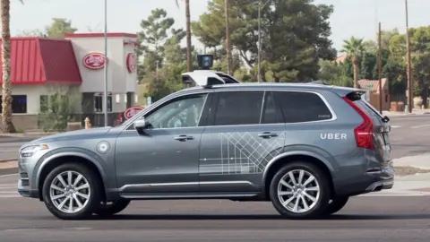 Reuters A self driving Volvo vehicle, purchased by Uber, moves through an intersection in Scottsdale, Arizona, U.S., December 1, 2017.