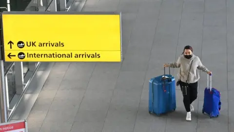 Getty Images  Woman at an airport