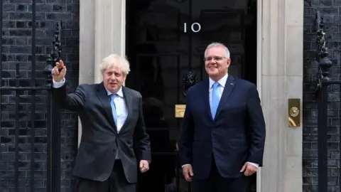 EPA Scott Morrison and Boris Johnson