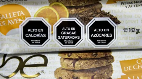 AFP Cookies with labels stating their high content in sugar, calories and saturated fat, in Santiago, on June 20, 2016