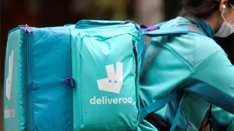 Reuters Deliveroo rider