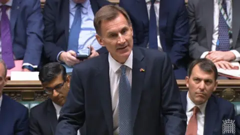 PA Media Jeremy Hunt speaking in House of Commons