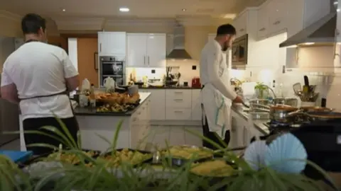 general views of chefs and kitchen