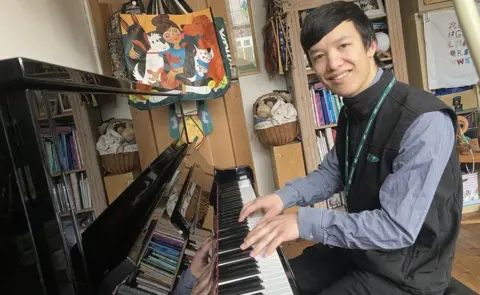 BBC Ruben playing the piano