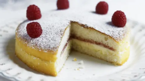 Science Photo Library Raspberry sponge cake