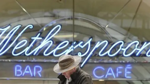 Reuters Wetherspoon's sign
